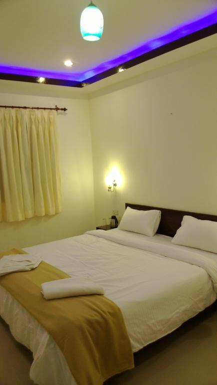 Hotel Hill Palace カウサニ 部屋 写真